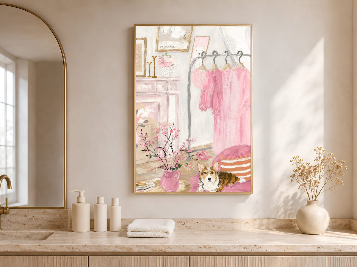 Coquette bedroom wall art in a gold frame above a bathroom vanity, pink closet illustration with soft natural light
