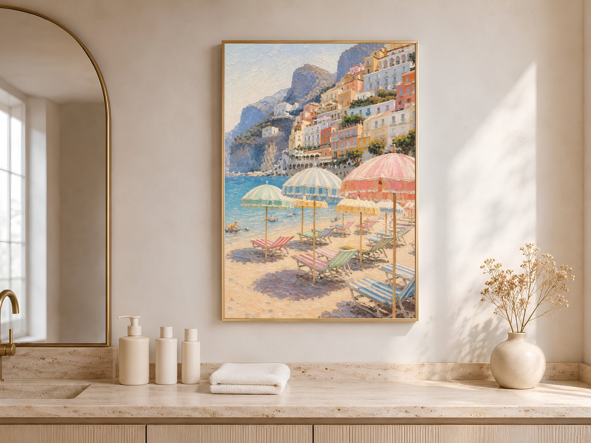 Framed Positano beach umbrellas print above a bathroom vanity with white bottles