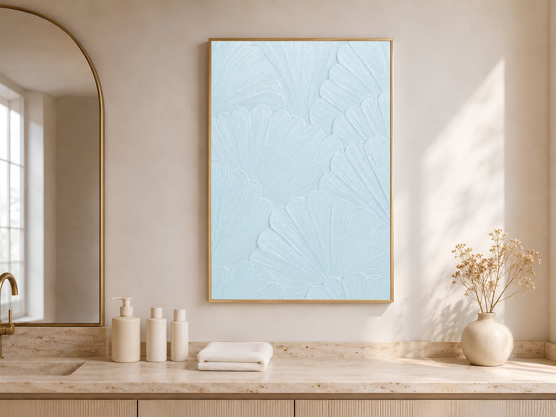 Powder blue mosaic print displayed above a bathroom vanity with towels and fresh flowers
