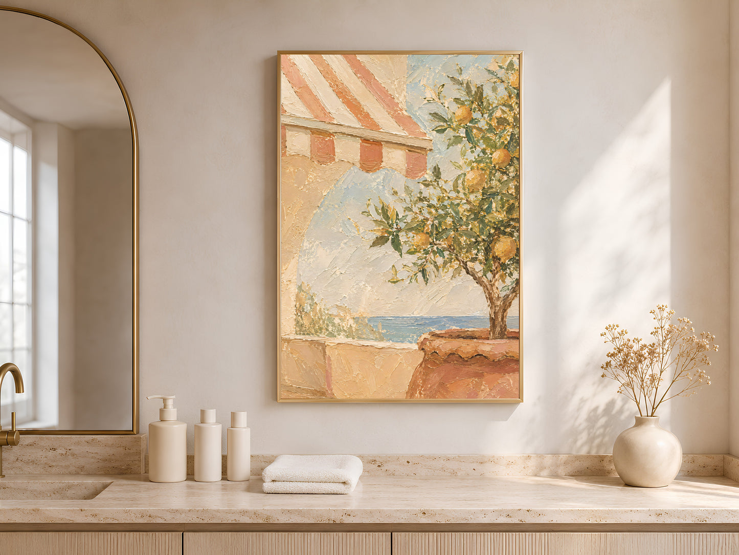 Mediterranean terrace wall art framed above a bathroom vanity counter with candles and a small vase
