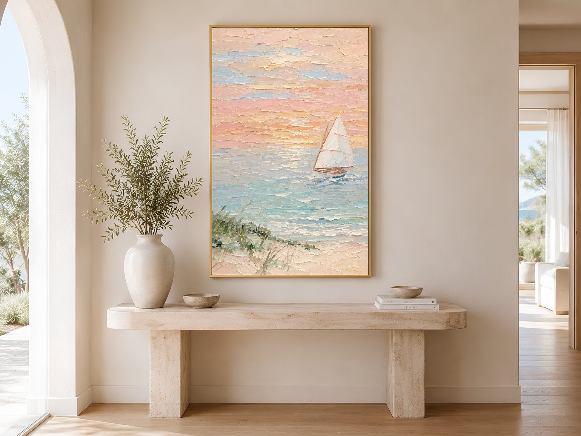 Framed pastel sailboat impasto print displayed on wall in a minimal neutral entryway with wooden console table, large white ceramic vase, and soft natural light
