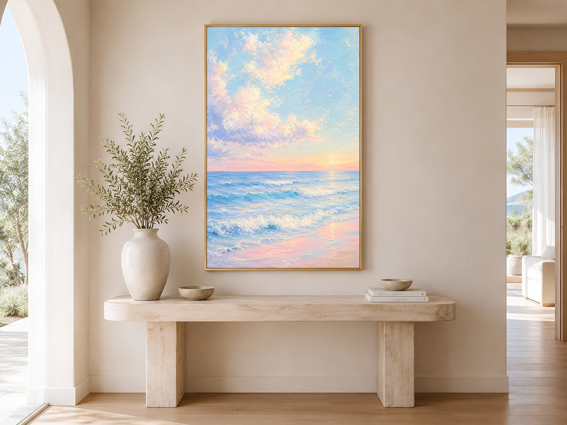 Framed impasto pastel ocean sunrise print on warm white wall above wooden bench in minimal entryway with tall vase


