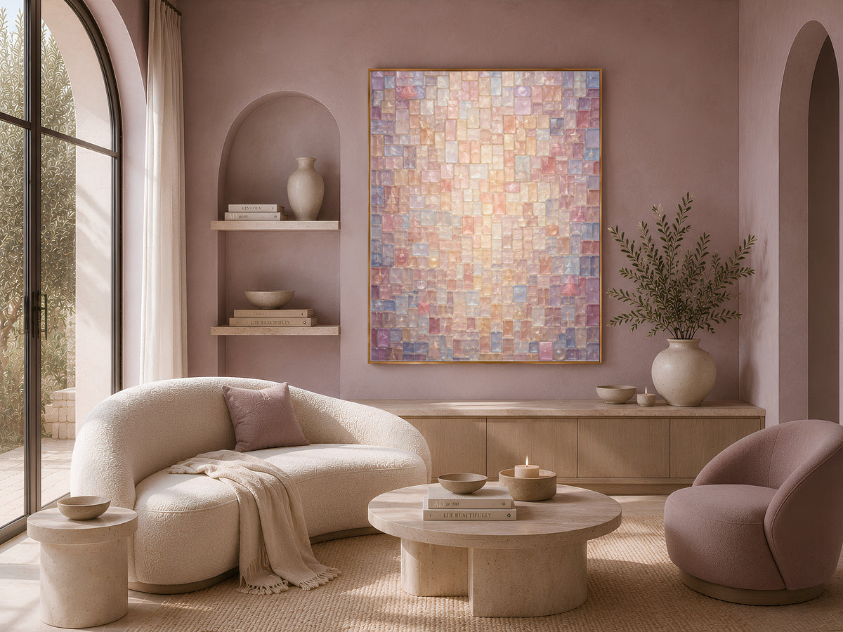 Stained glass mosaic wall art framed on a wall beside a cream sofa and round boucle chairs