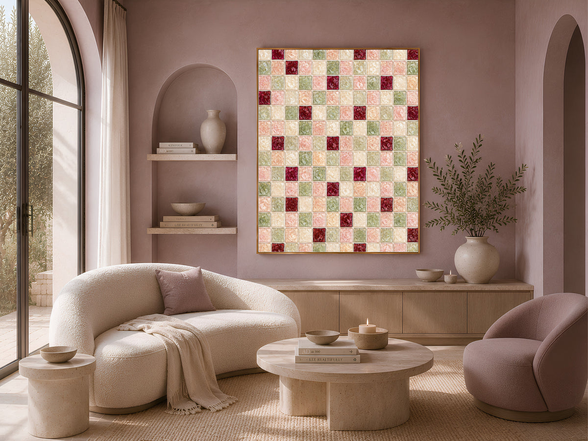 Sage green blush mosaic wall art framed above a curved sofa and armchairs in a cozy living room