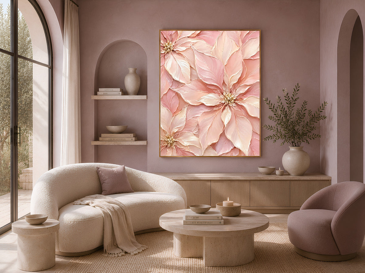 Pink poinsettia painting framed above cream sofa and armchairs in living room