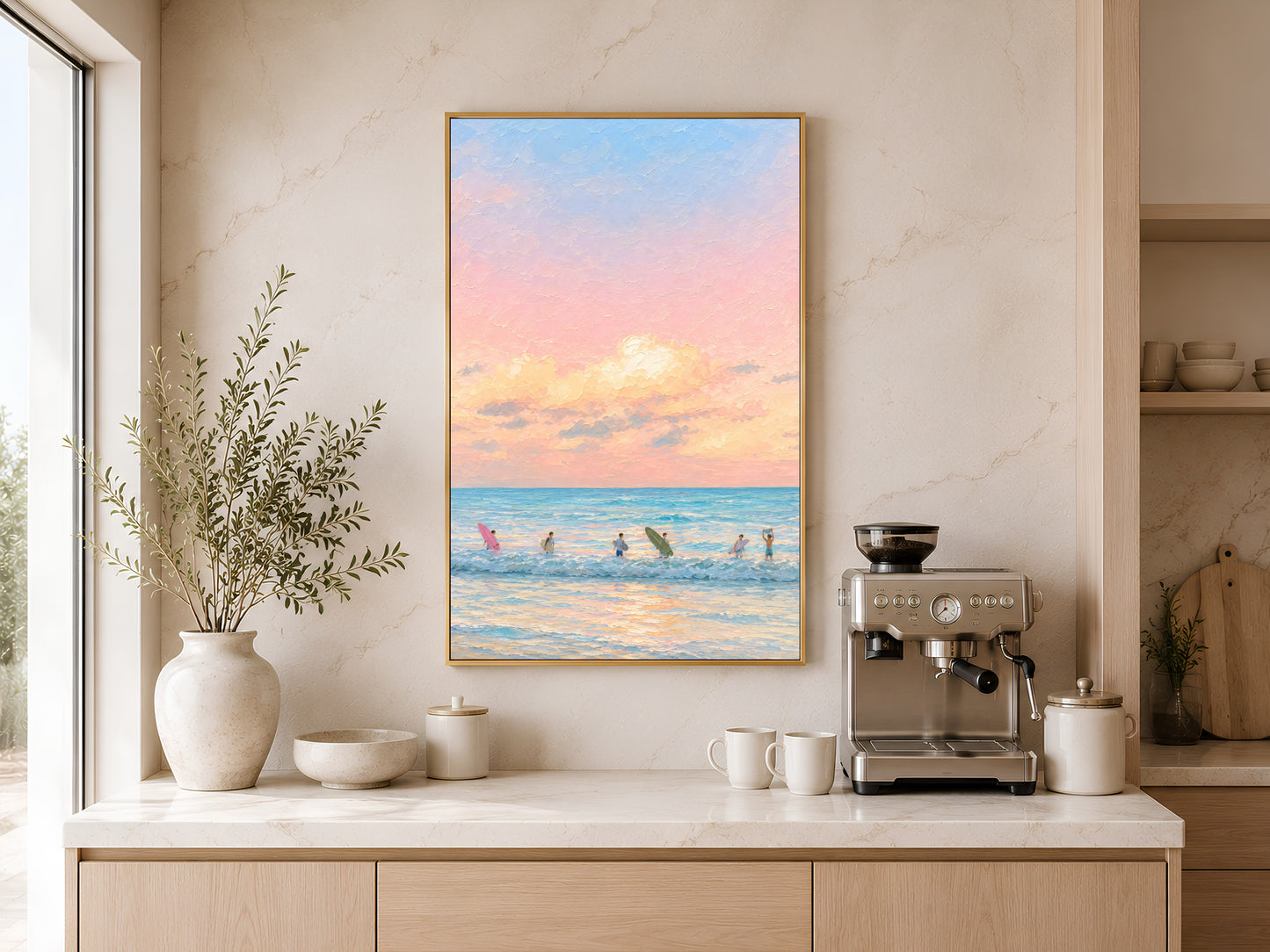 Framed impasto pastel sunset surf print on warm beige wall above console table with coffee maker in minimal kitchen
