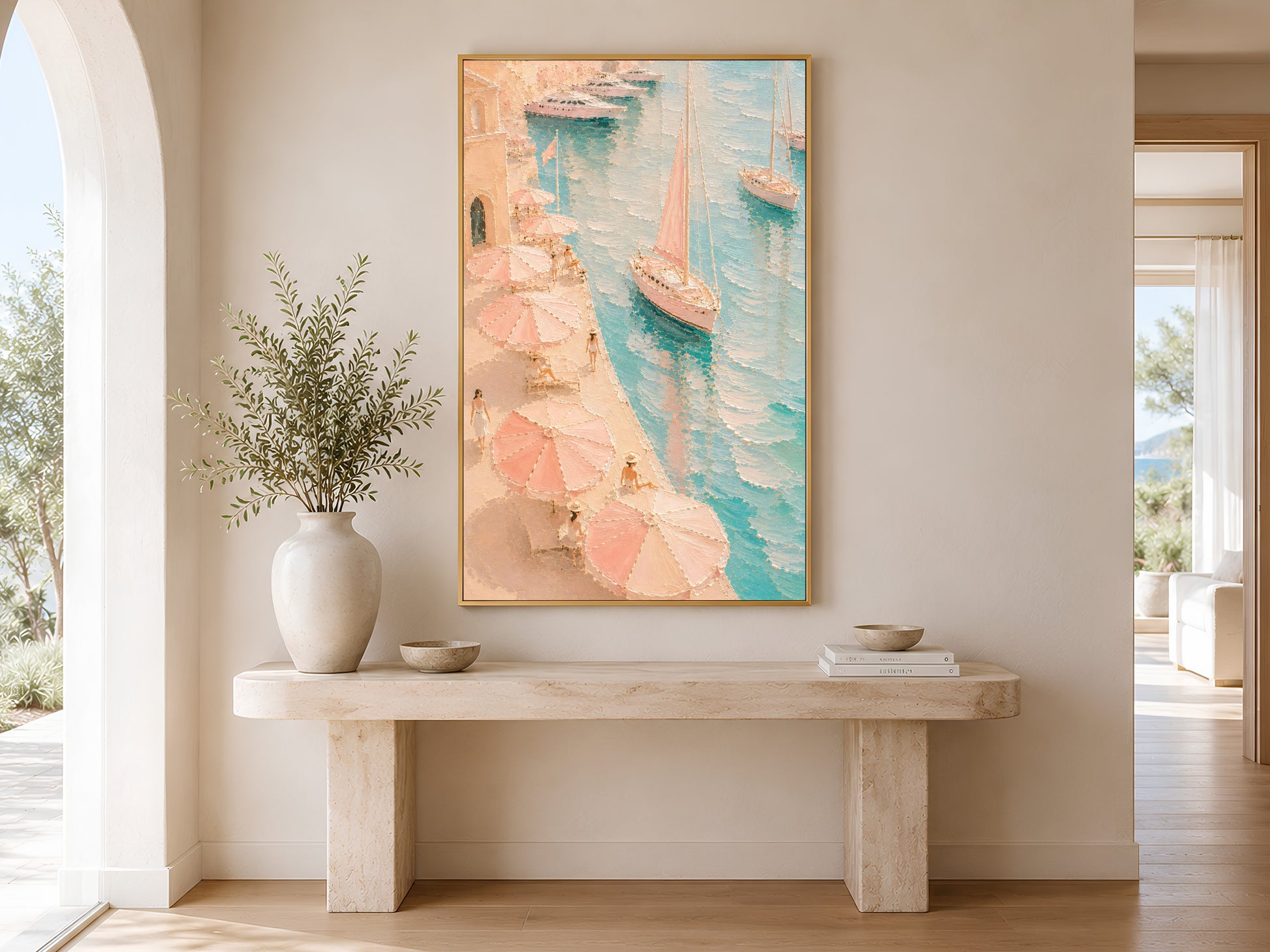 Framed Mediterranean harbor wall art in peach and teal tones on a cream wall in a bright Scandinavian entryway with console table and greenery
