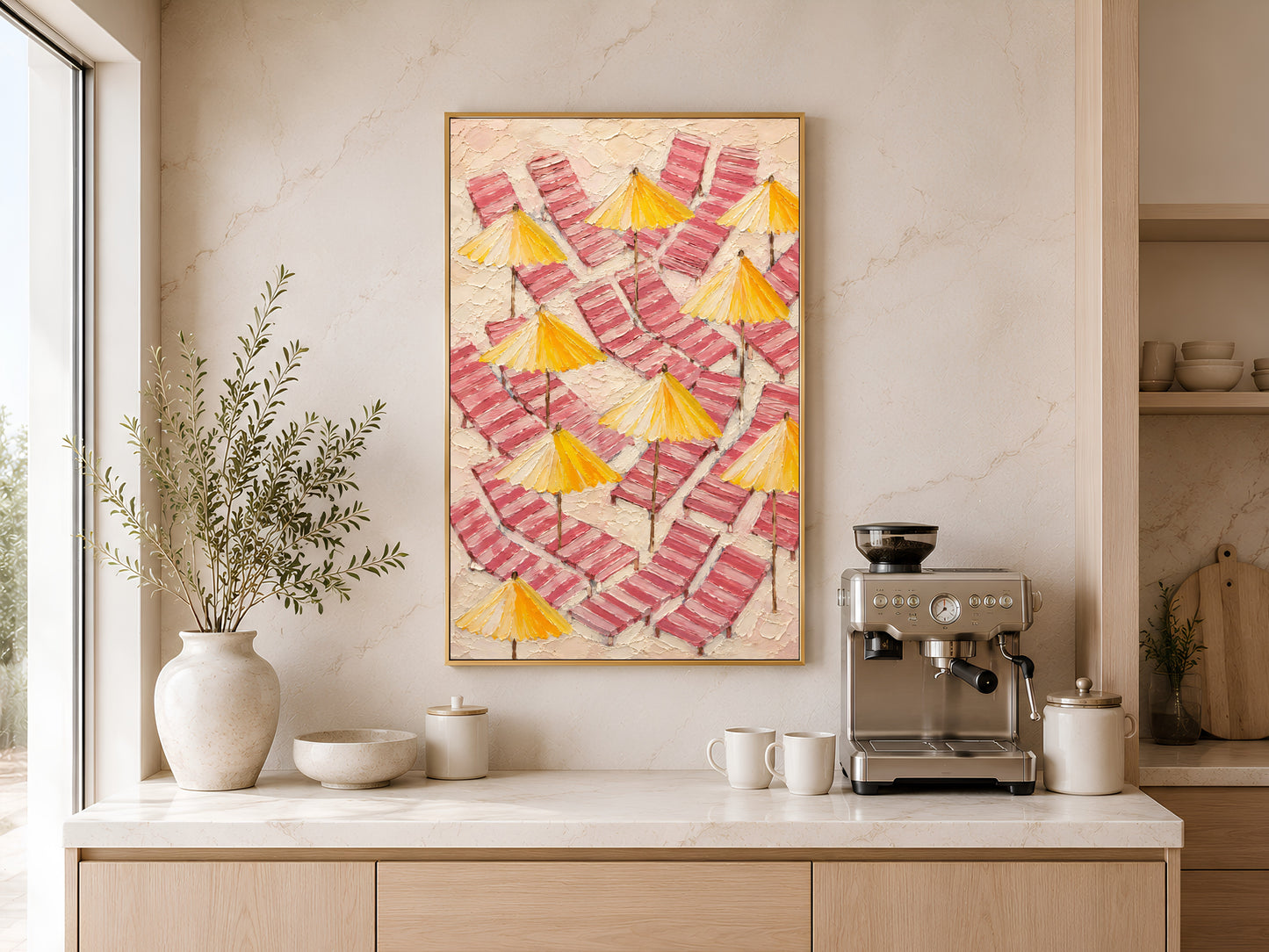 Pink beach umbrella wall art printable hanging above a coffee station in a warm minimalist kitchen with coastal Mediterranean styling.