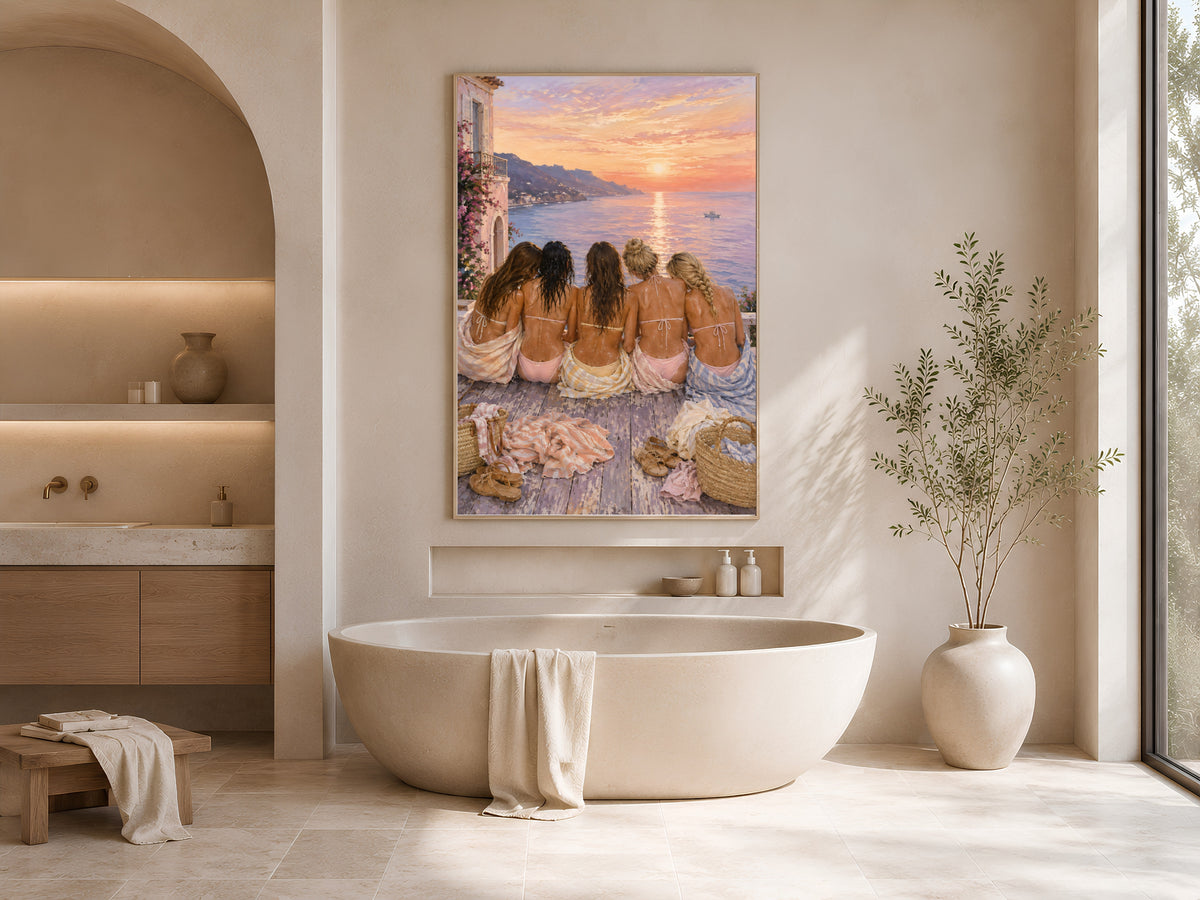 Girls trip sunset print framed above a freestanding tub in a warm neutral bathroom