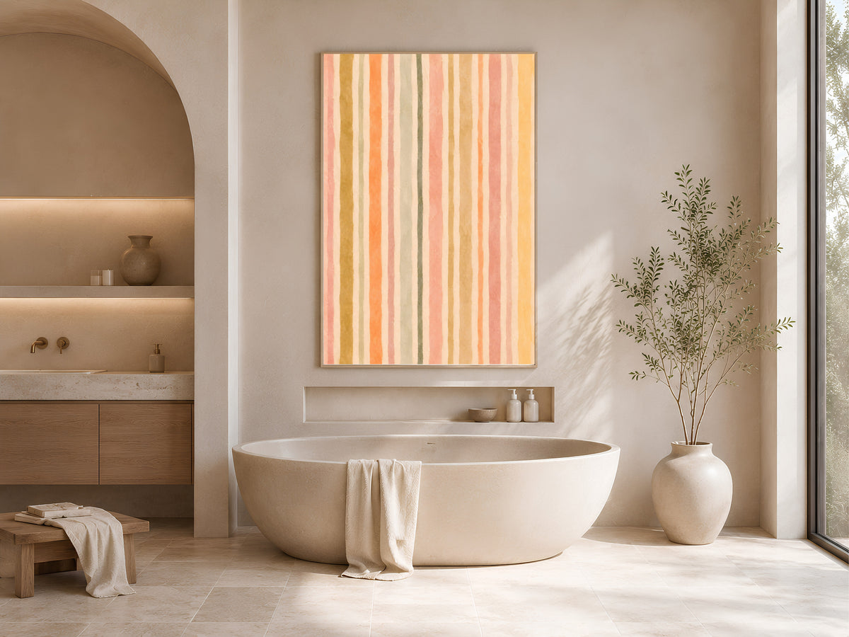 Pastel stripe wall art above a modern soaking tub bathroom