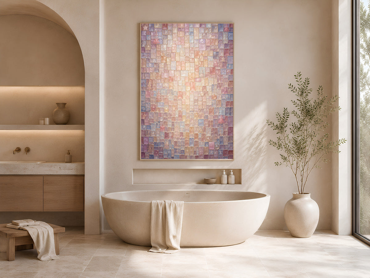 Framed pastel mosaic Christmas print above a freestanding tub in a sunlit arched bathroom