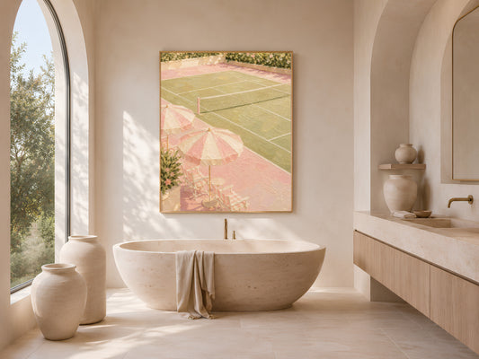 Pink tennis court wall art framed above arched window in bathroom, preppy country club decor

