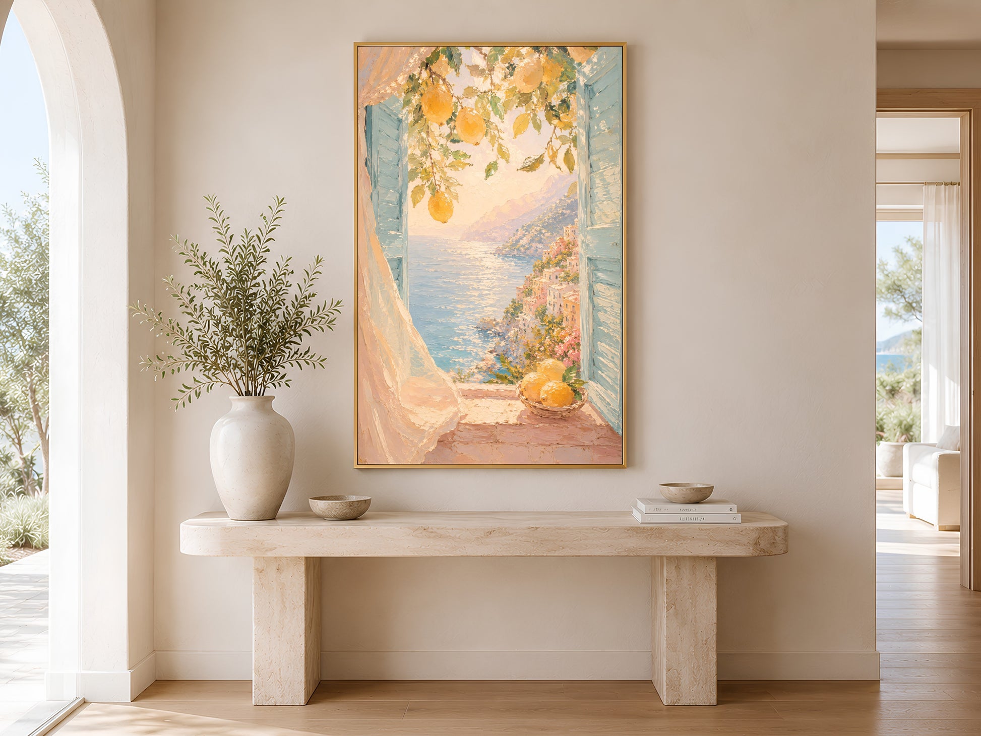 Amalfi Coast lemon window print in gold frame displayed above a console table in a calm neutral home office