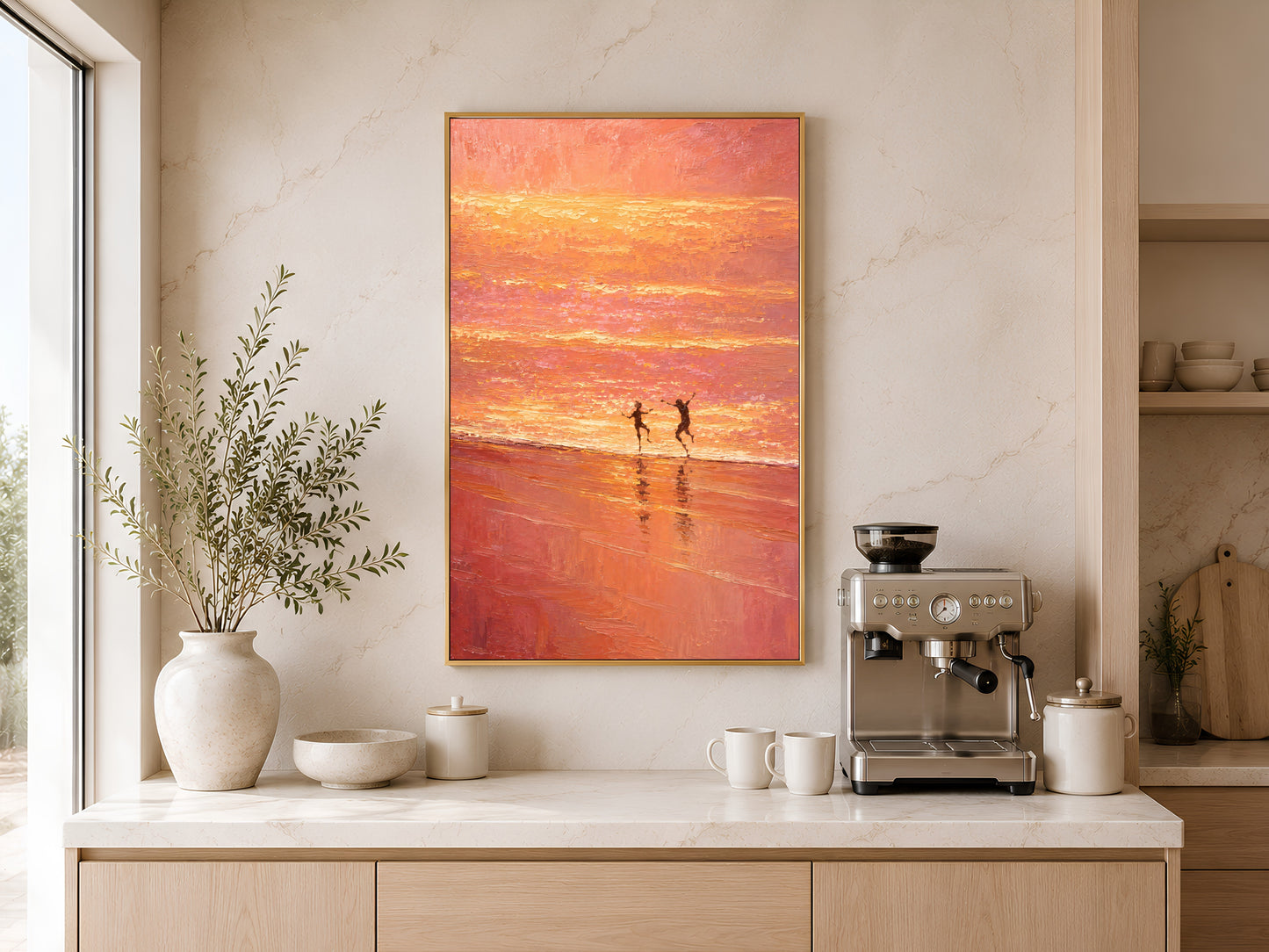 Romantic beach sunset wall art printable hanging above a coffee station in a warm minimalist kitchen with coastal-inspired styling.