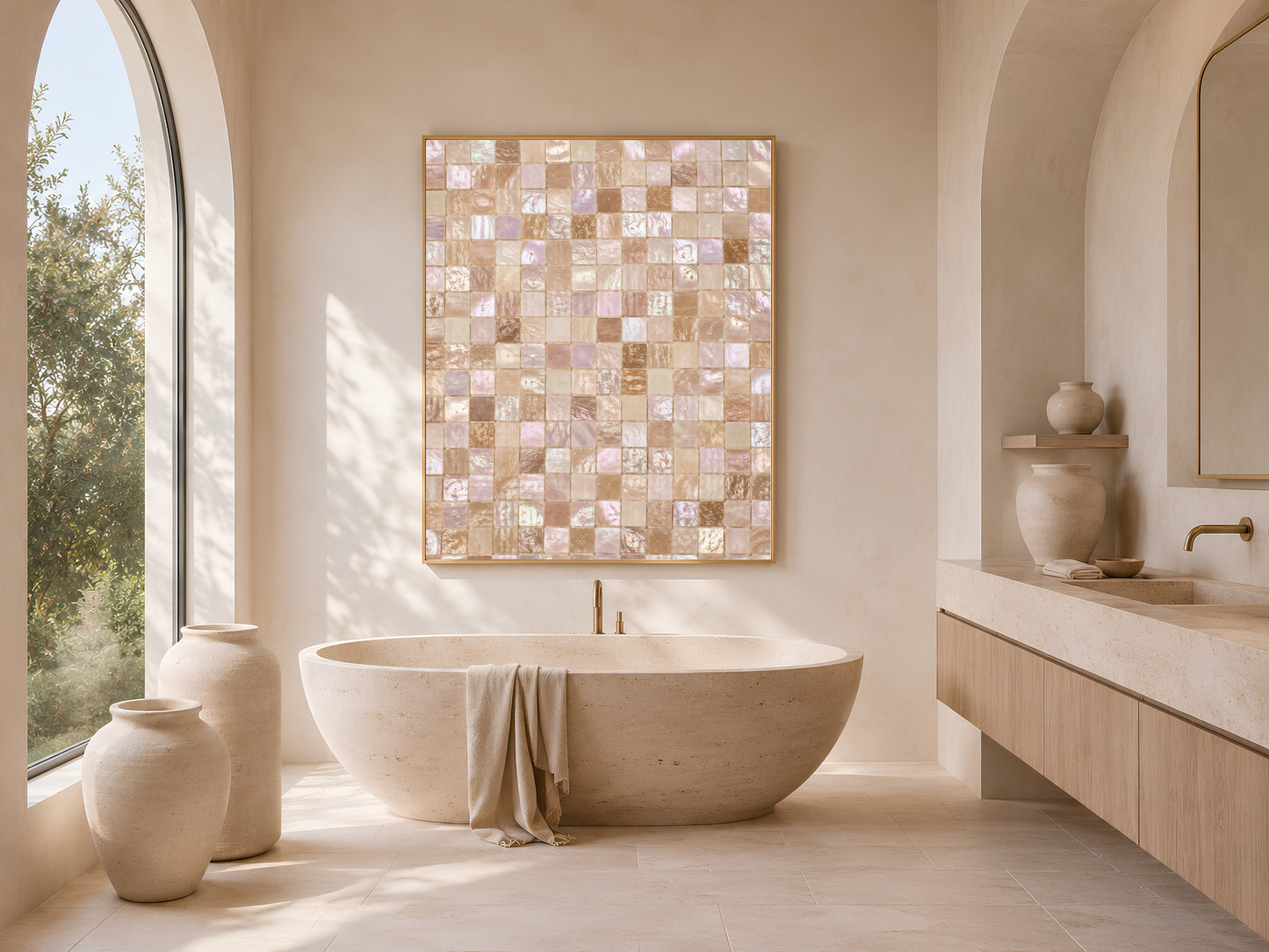 Framed iridescent mosaic tile print above a freestanding tub in an arched, sunlit bathroom.
