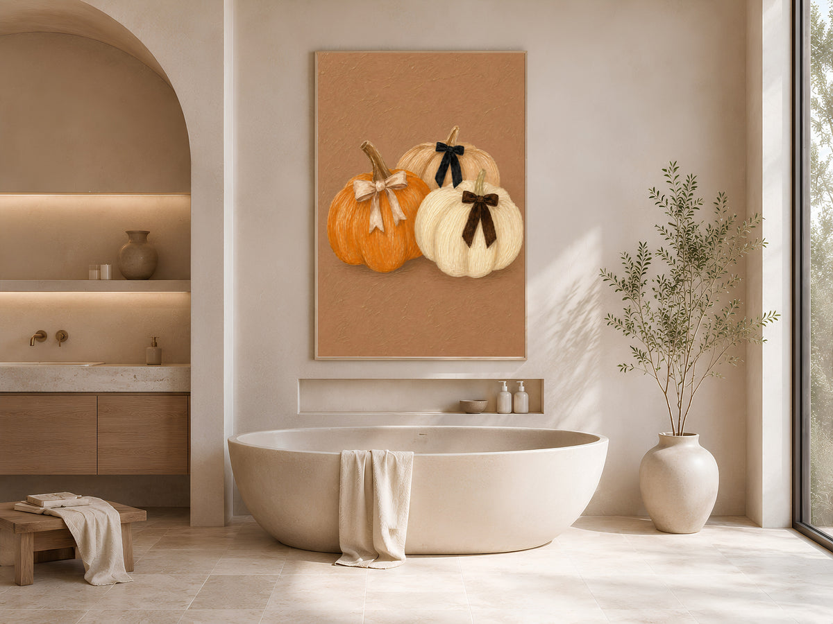 Coquette pumpkin wall art with velvet bows in a modern soaking tub bathroom