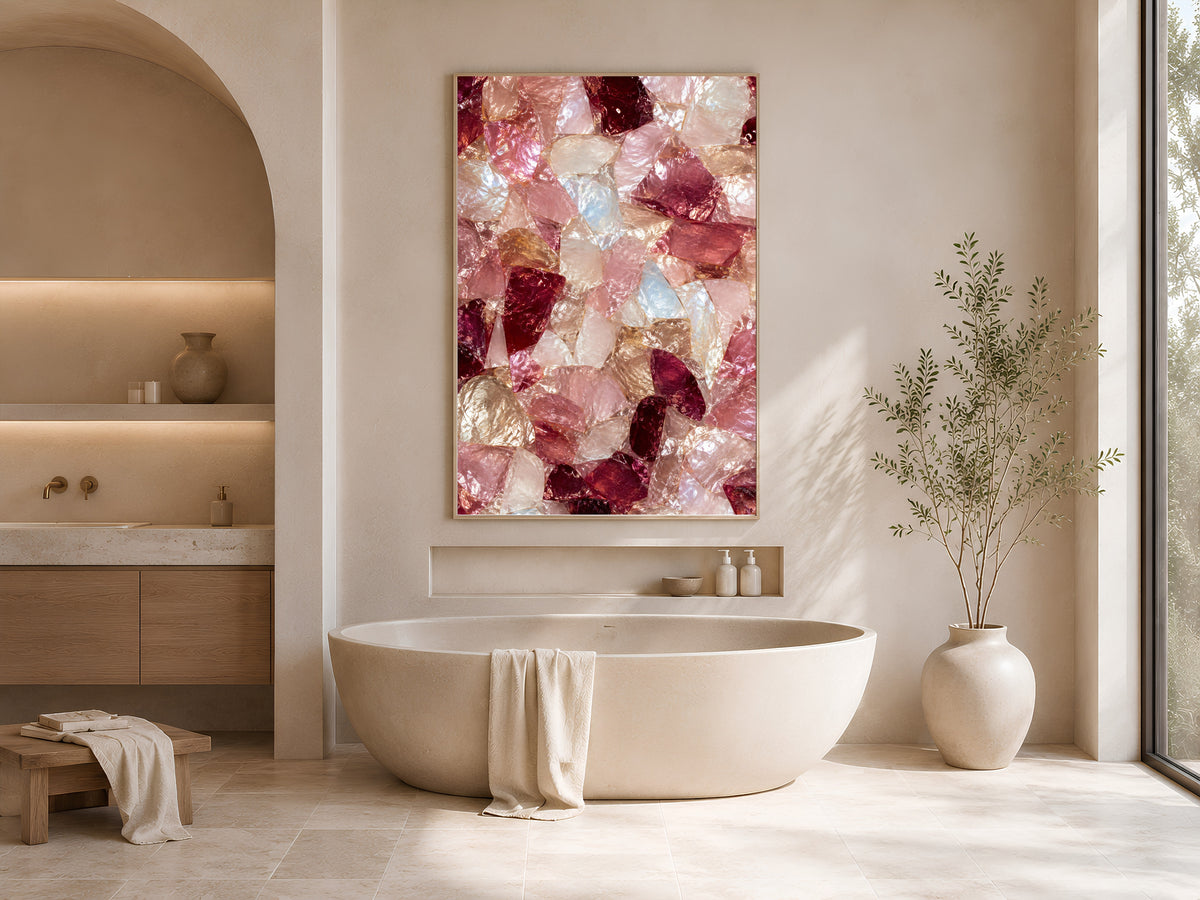 Crystal mosaic print framed above an oval soaking tub in a neutral arched bathroom