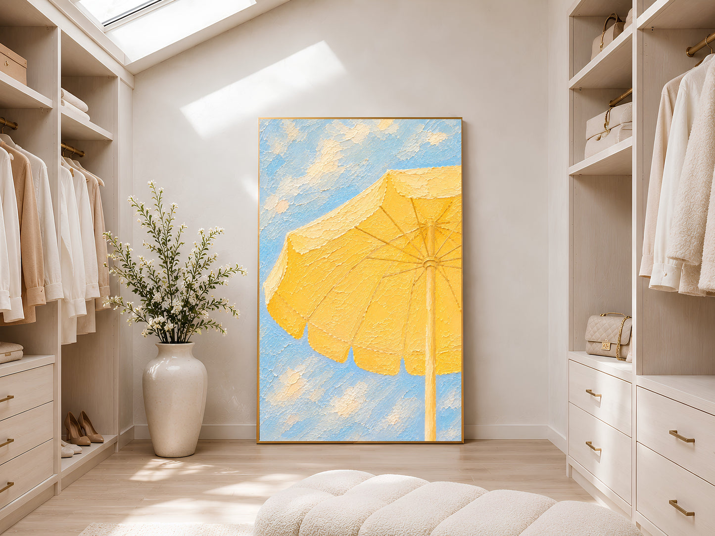 Framed yellow beach umbrella impasto print displayed in a light-filled walk-in wardrobe with white shelving, tall ceilings and natural light
