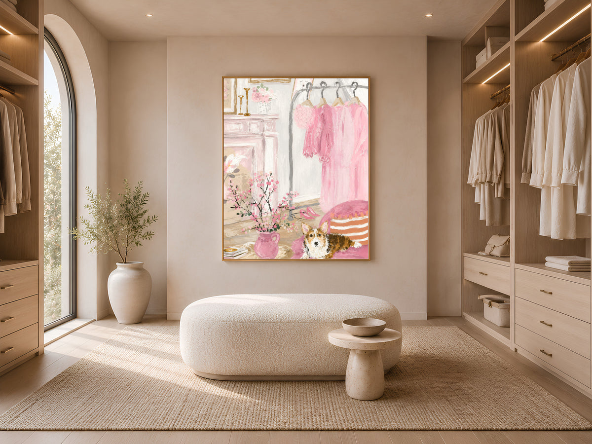 Coquette bedroom painting in a gold frame above a mauve wall in a walk-in closet with an ottoman
