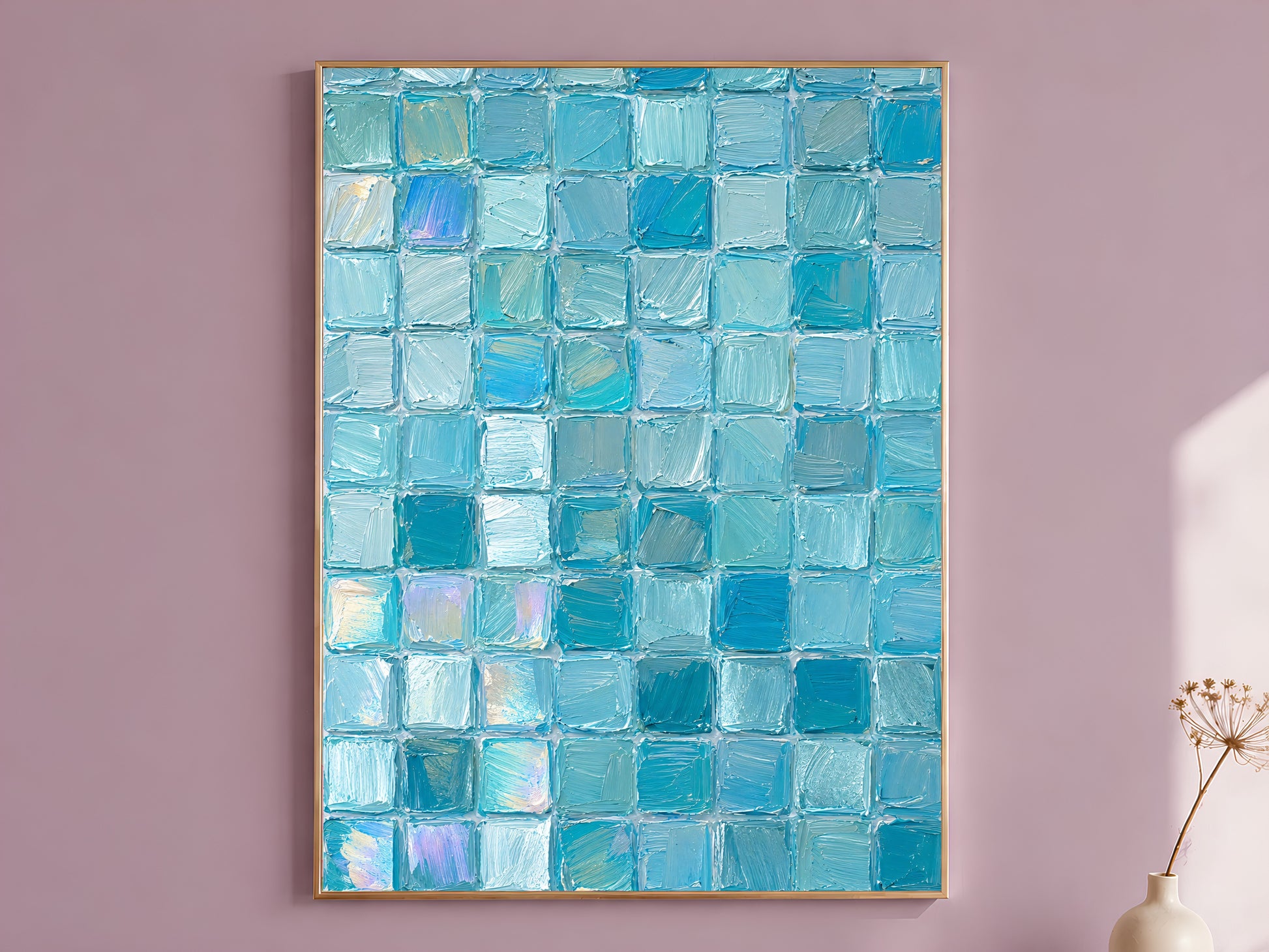 Turquoise aqua impasto mosaic tile grid wall art in gold frame on mauve wall with dried flower stems
