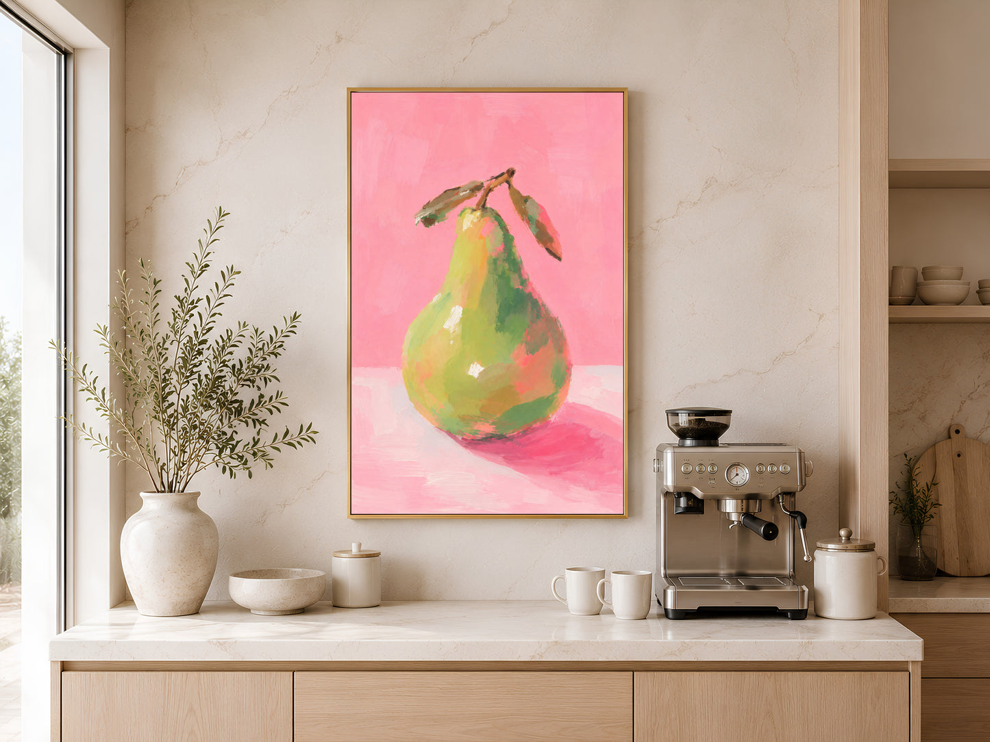 Framed impasto green pear print on warm beige wall above console table with coffee maker in minimal coastal kitchen
