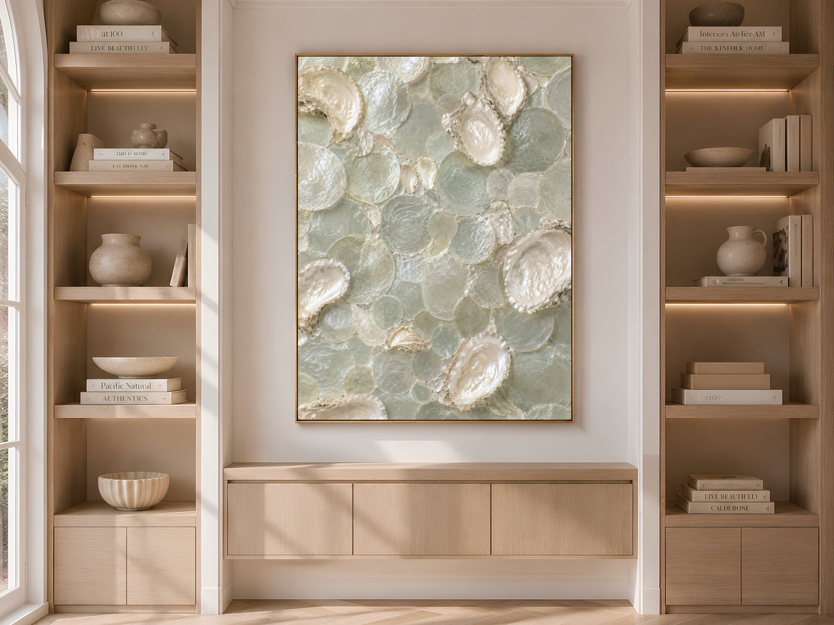 Sage green mosaic art framed and displayed on a built-in bookshelf with neutral decor