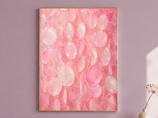 Pink capiz shell wall art print in a gold frame on a soft mauve wall with a dried flower stem beside it, showing full candy pink and pearl impasto texture

