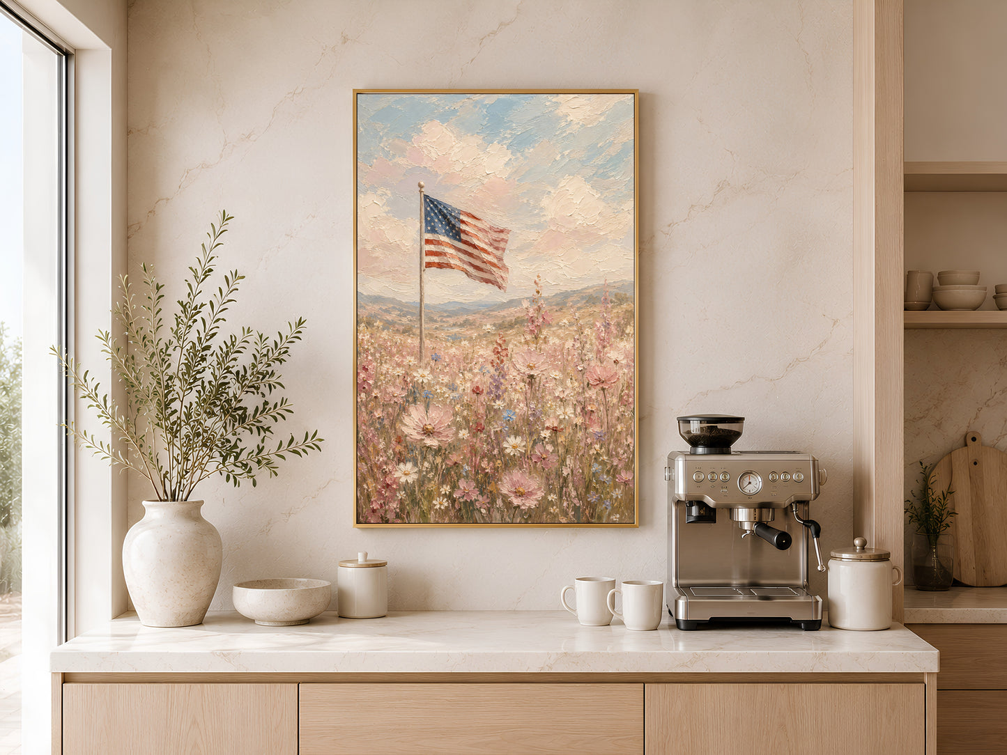 American flag wildflower field impasto painting in a gold frame displayed above a light wood sideboard in a modern kitchen with neutral tones, neutral vases, and warm natural light
