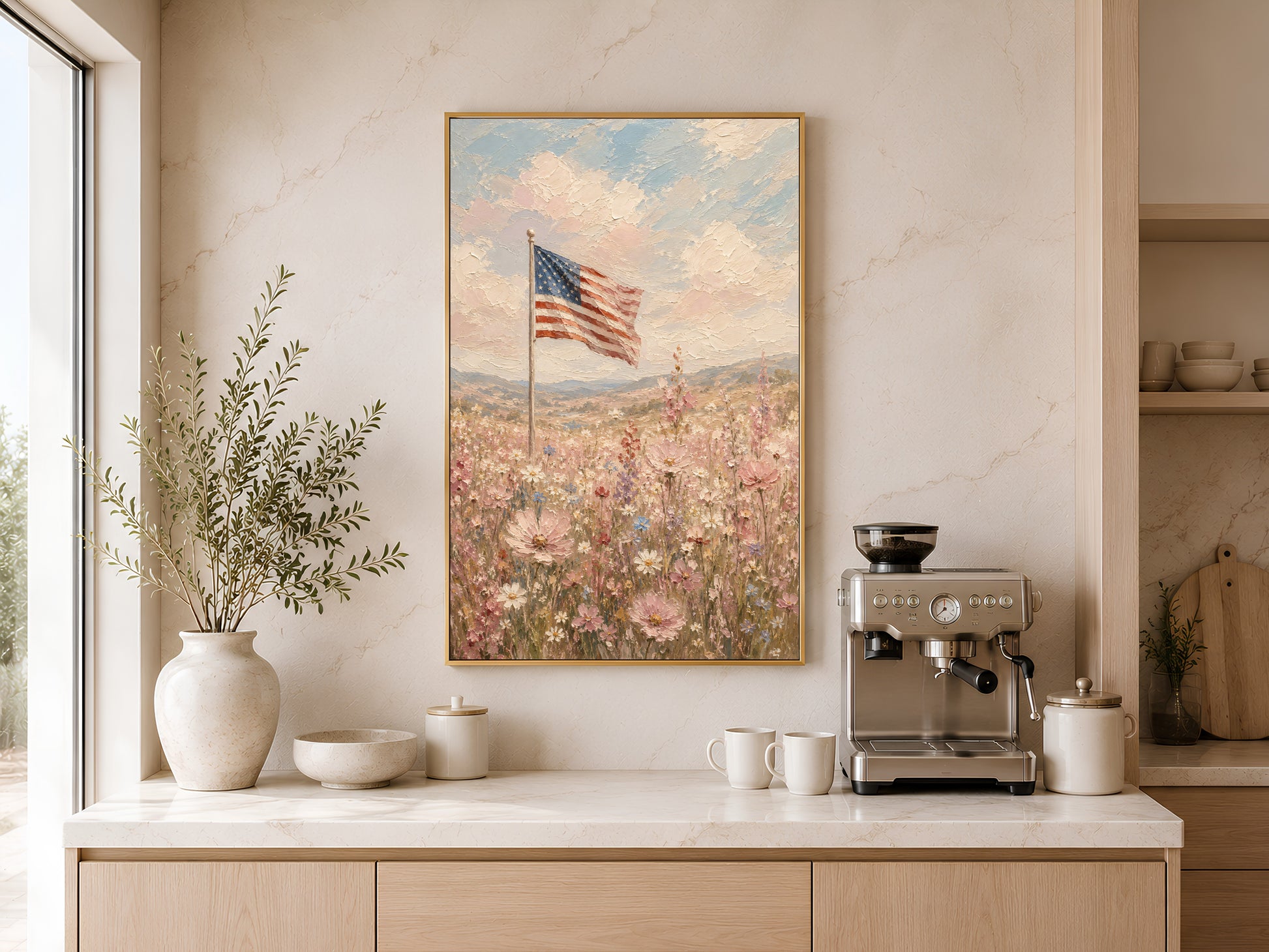 American flag wildflower field impasto painting in a gold frame displayed above a light wood sideboard in a modern kitchen with neutral tones, neutral vases, and warm natural light
