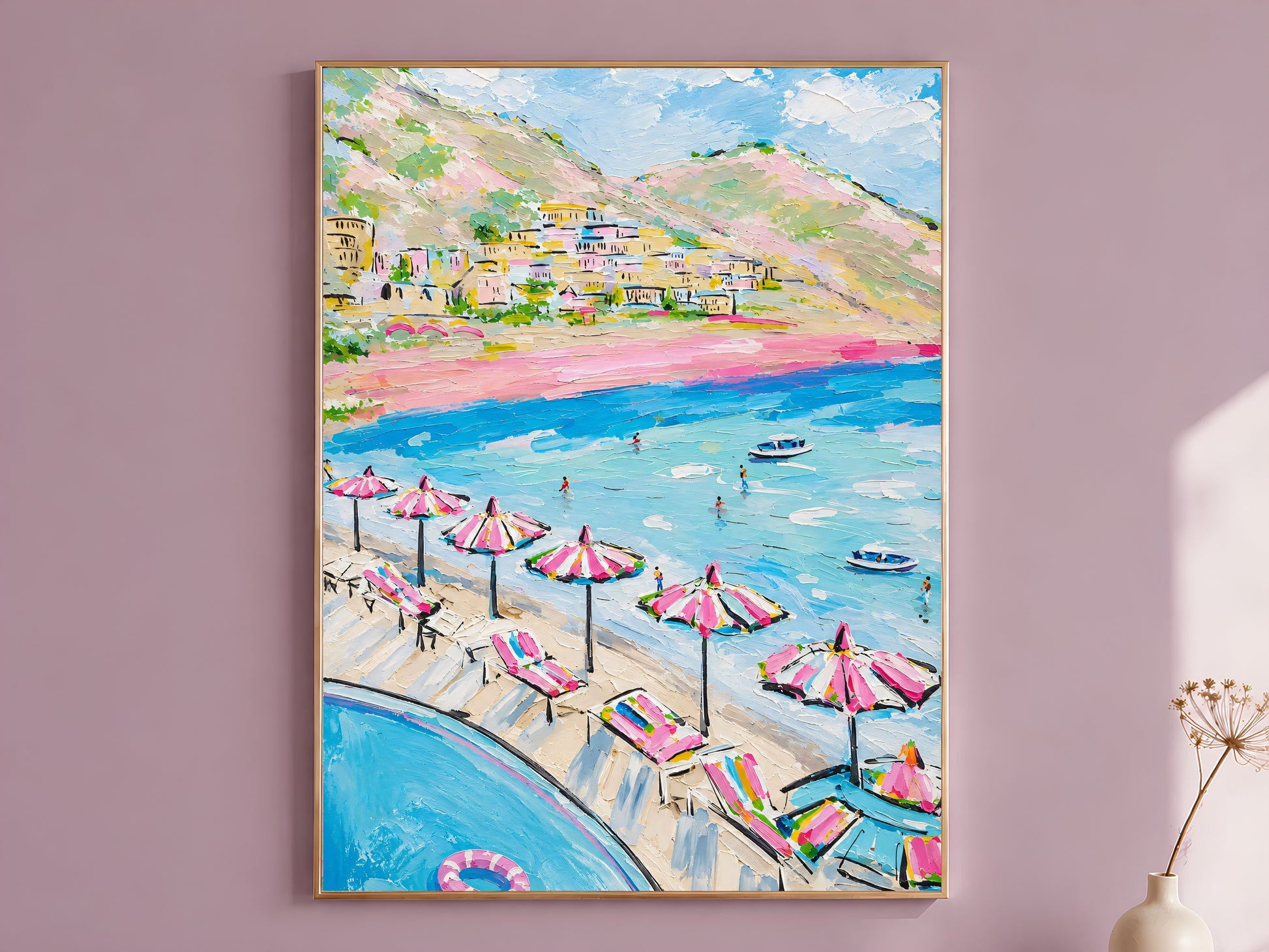 Colorful impasto oil painting style Positano beach wall art print in a thin wood frame displayed against a dusty mauve wall, showing pink striped umbrellas, turquoise water, swimming figures, boats, and Amalfi Coast cliffside village