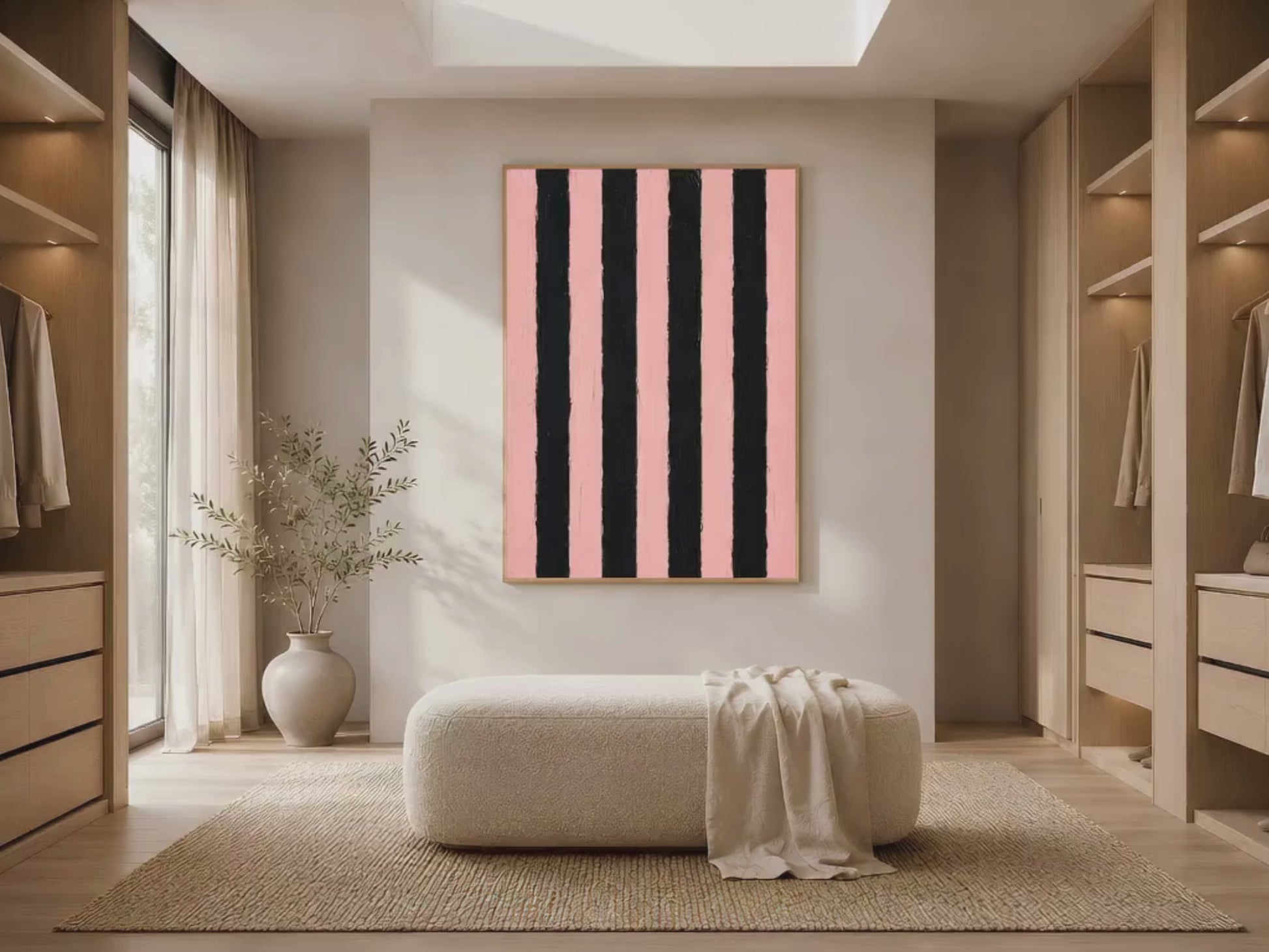 Bold pink and black stripe print in gold frame in bright dressing room with large window white cabinetry and vase (video)
