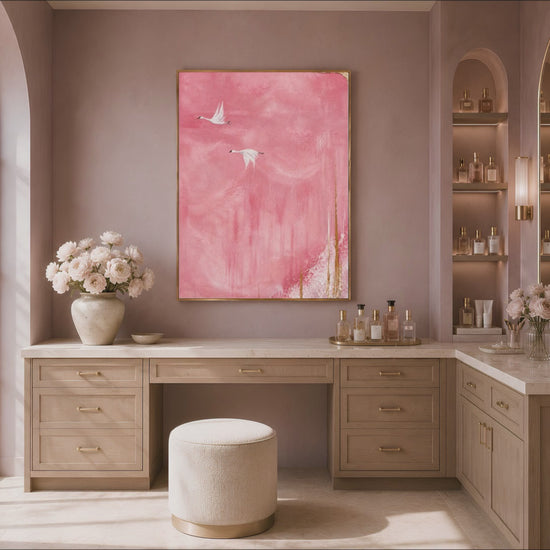 Flying cranes wall art displayed above a vanity desk with fresh florals, pink sky Japandi bird painting print