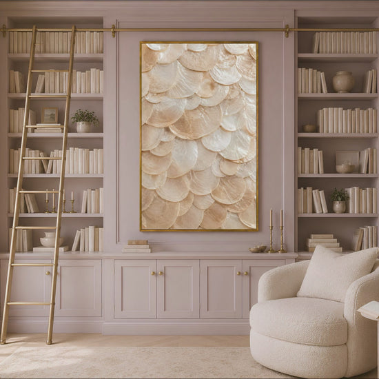 Video preview of a framed capiz shell print displayed in a light-filled room with built-in bookshelves.