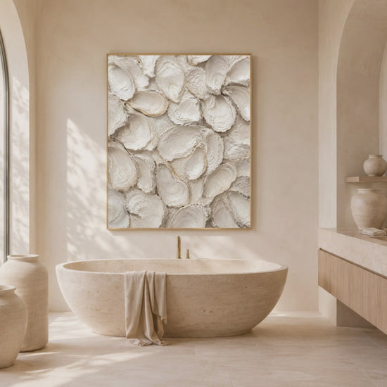 Video preview of a framed oyster shell print displayed in a sunlit bathroom with a freestanding tub.