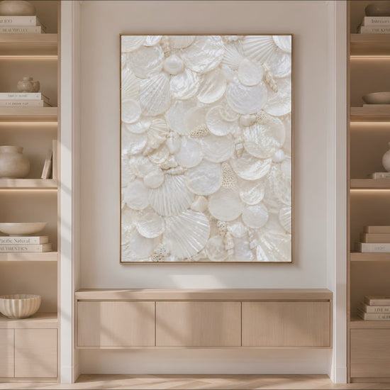 Video preview of iridescent seashell print displayed in a built-in bookshelf niche between styled shelves and a wood cabinet.