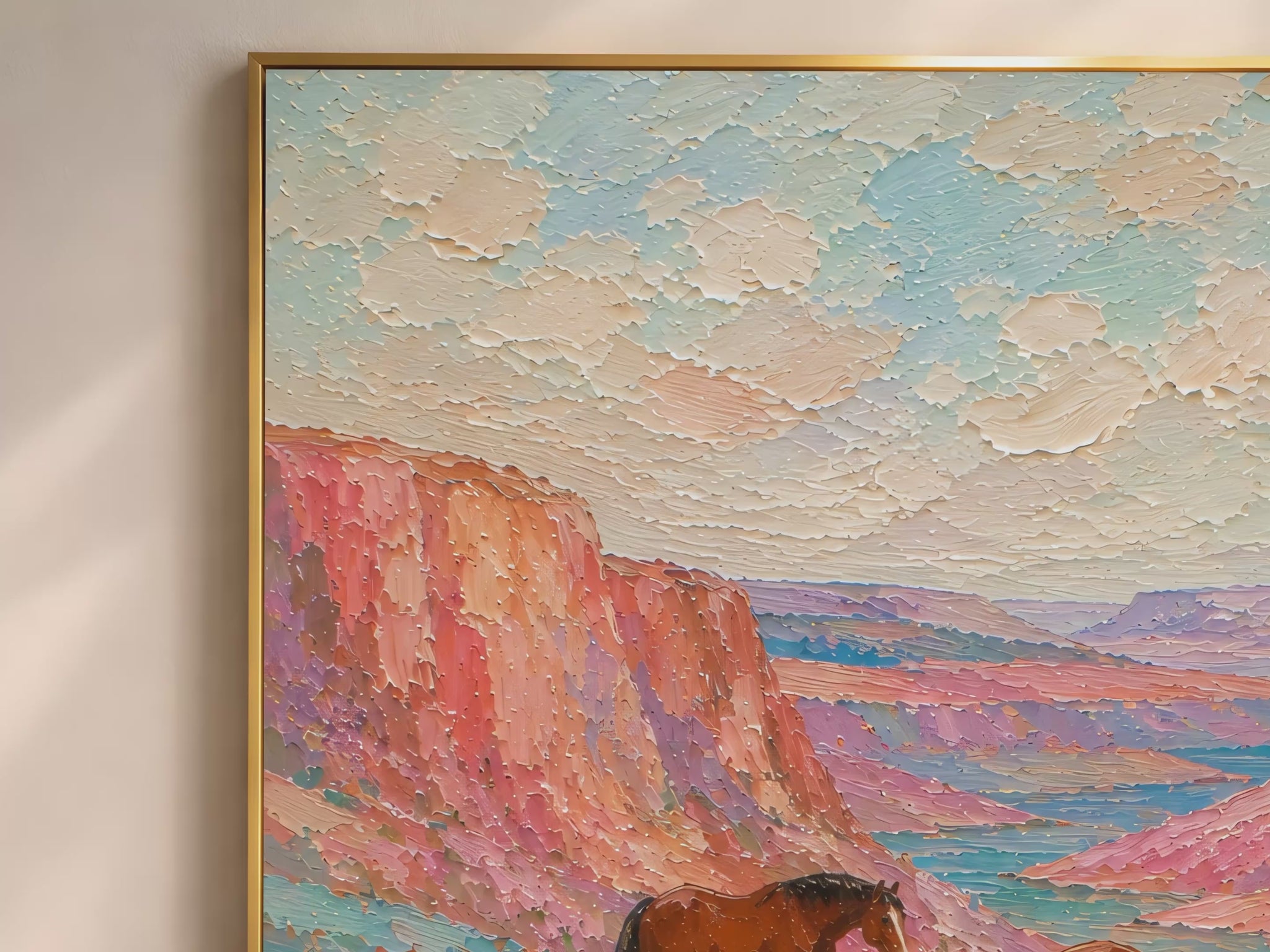 Two chestnut horses in a wildflower canyon impasto oil painting video mockup thumbnail showing thick palette knife texture, terracotta canyon walls, pink and lavender wildflowers, and creamy impasto sky in a warm interior setting
