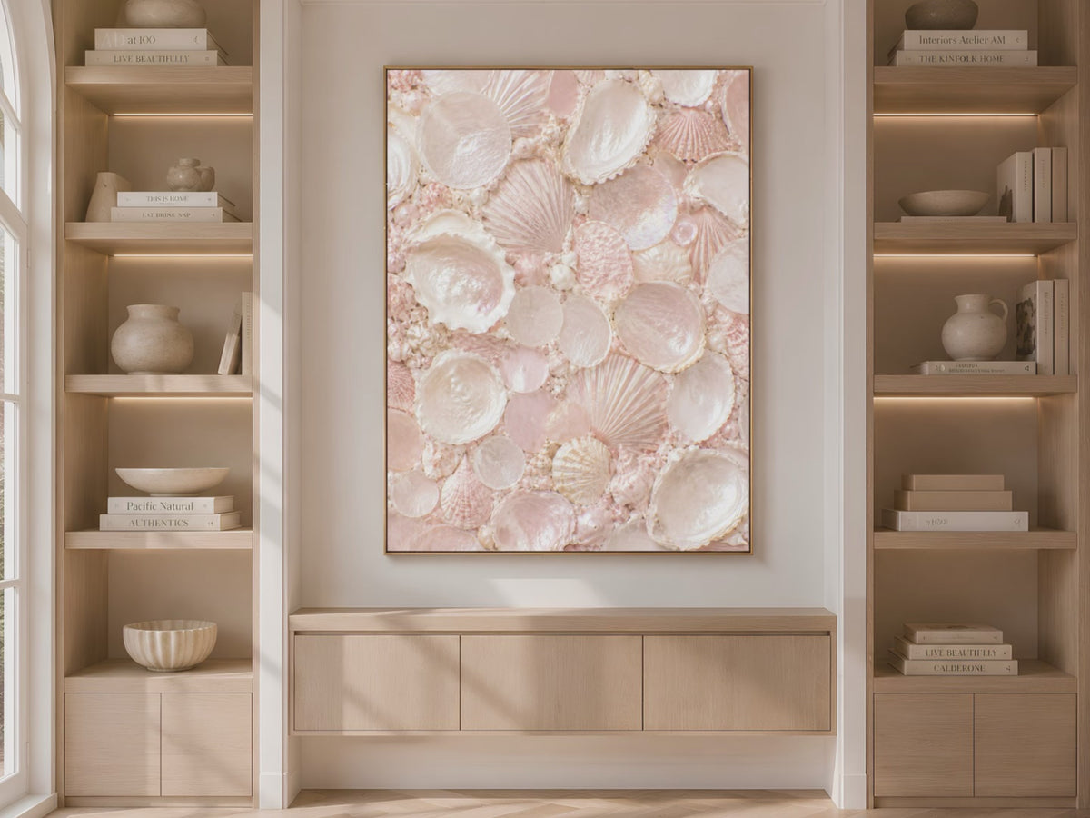 Video preview of blush pink seashell mosaic wall art displayed on a bookshelf wall