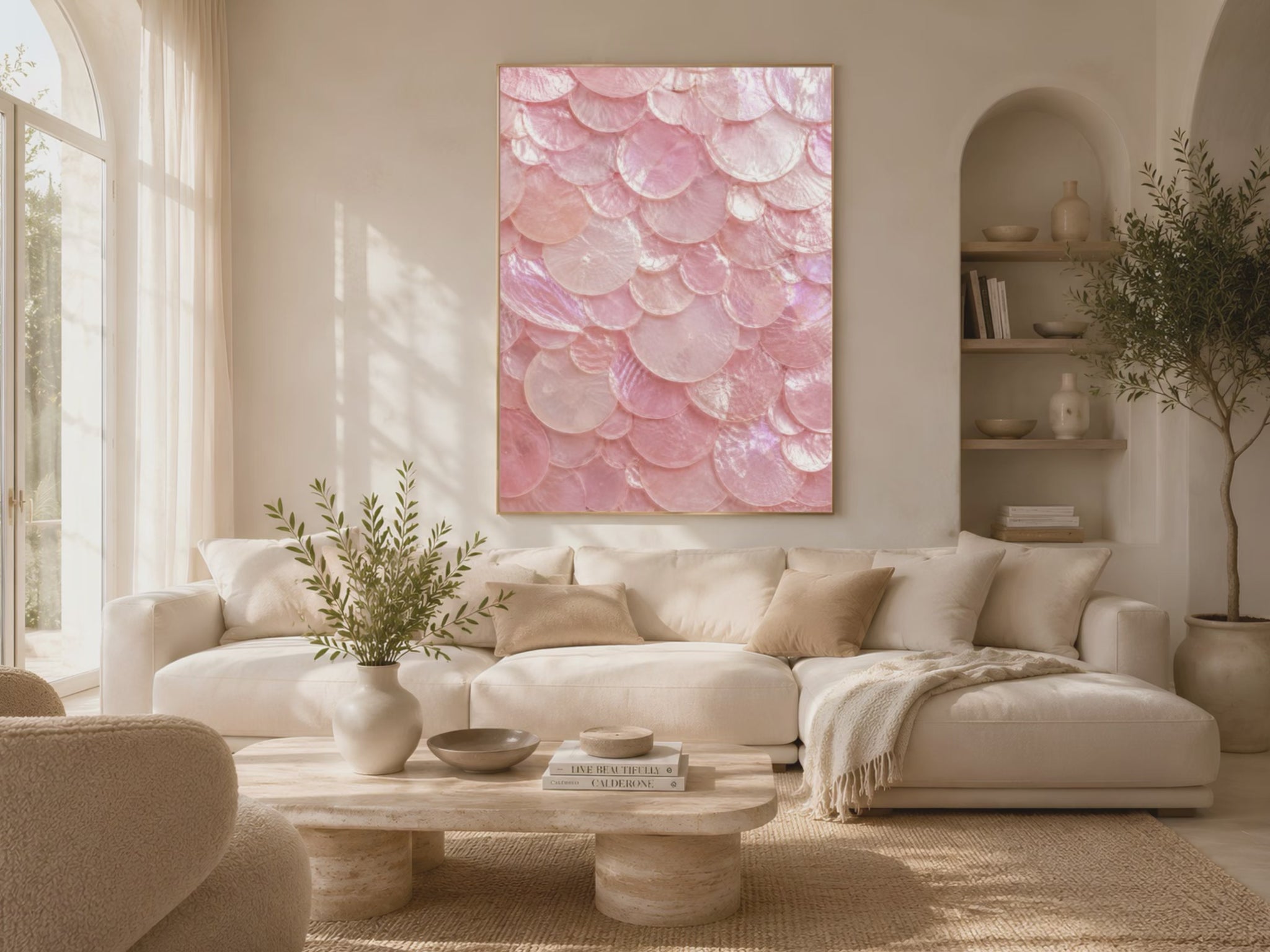 Video preview of a framed pink shell print displayed in a bright living room with a sofa and armchairs.
